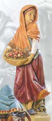 Donna con cesto frutta